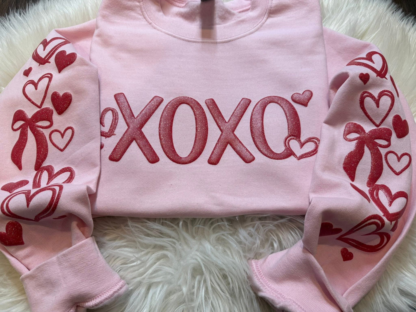 #277a XOXO glitter puff with sleeves